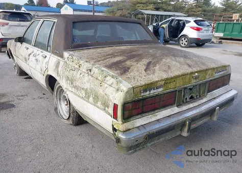 1987 Chevrolet Caprice Classic Brougham z USA, uszkodzony, nr VIN 1G1BU51H9HX206900